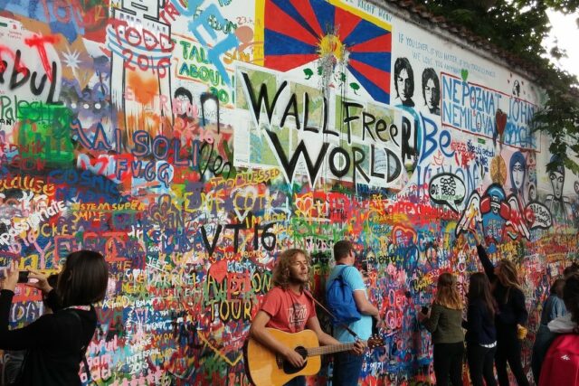 John Lennon wall covered in graffiti